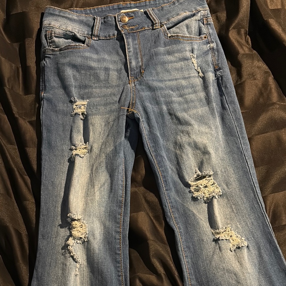 Distressed Blue Jeans